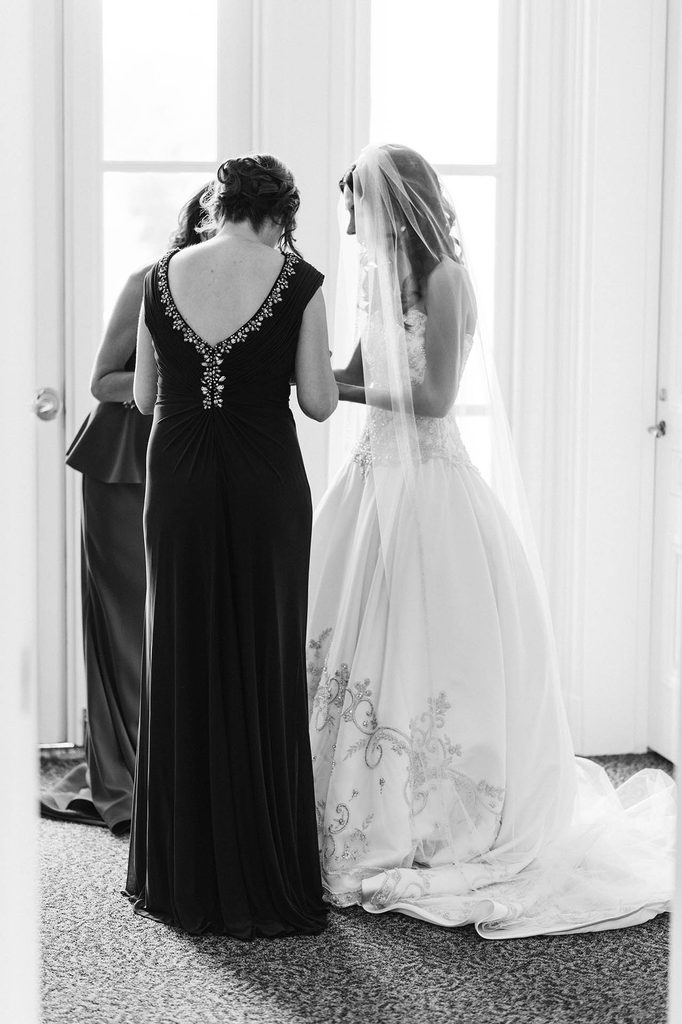 Black and White wedding photo of the bride and her mother getting ready at The Wadsworth Mansion